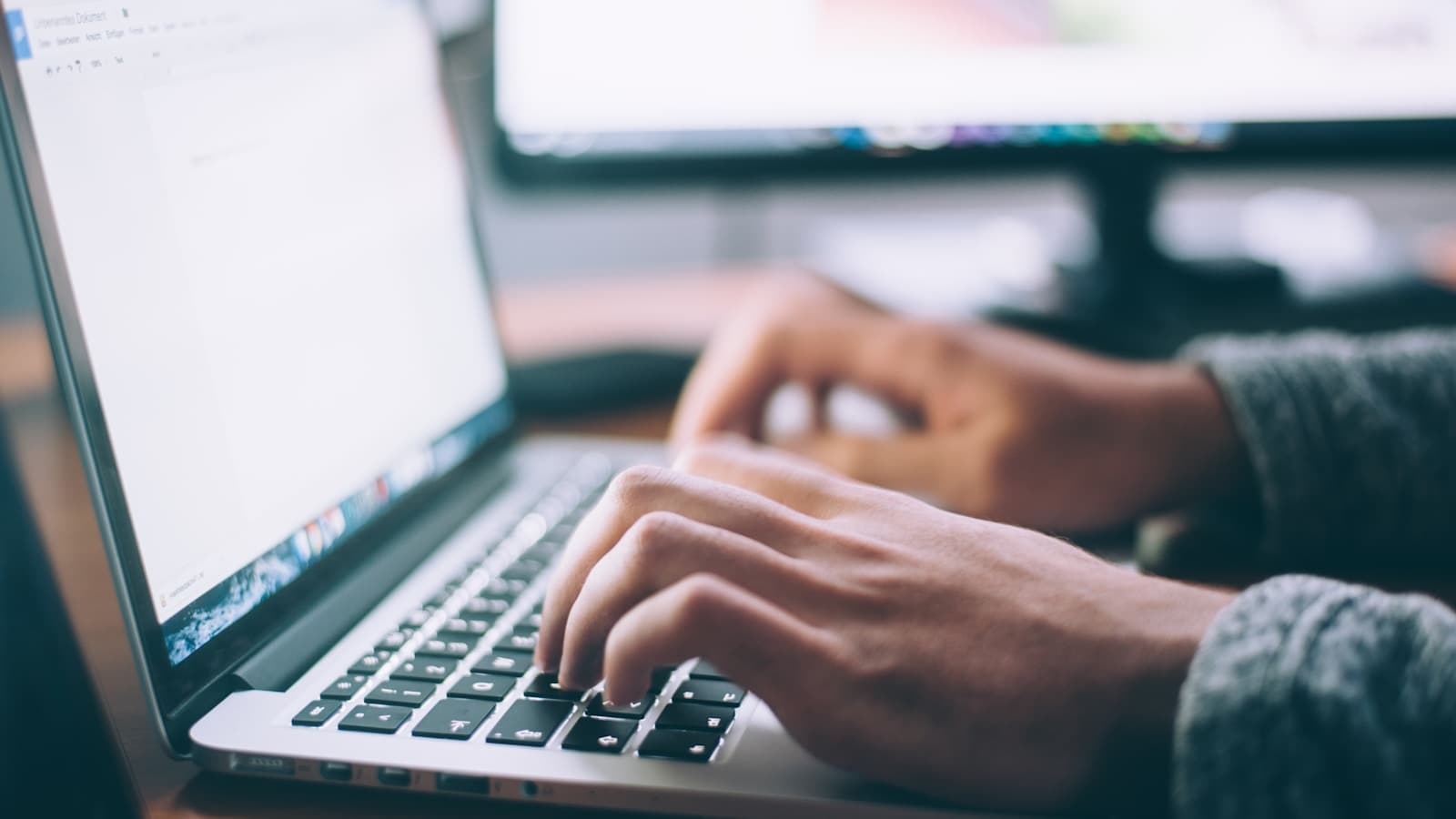 Small business owner comparing options on a laptop