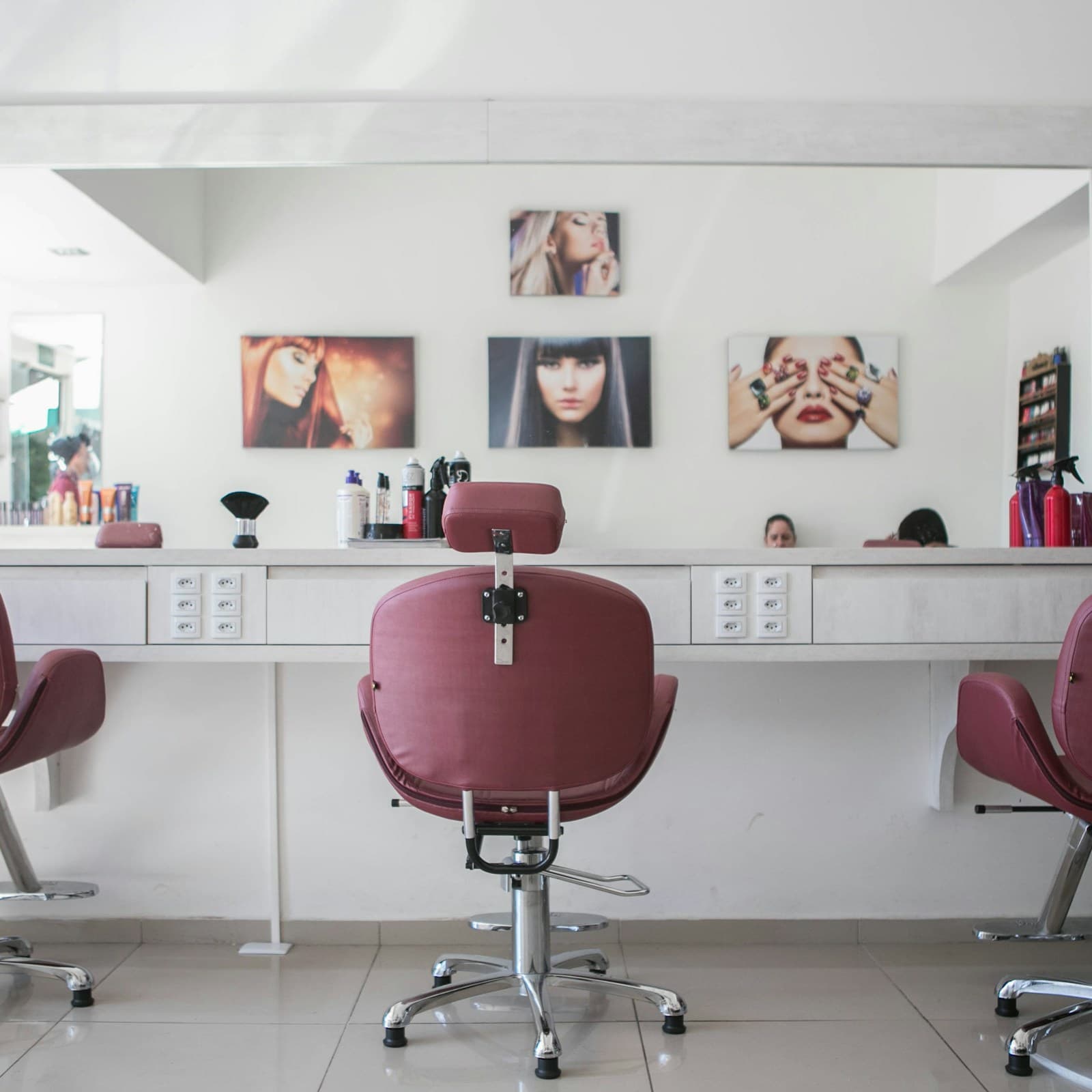 Stylist with a client in a modern hair salon