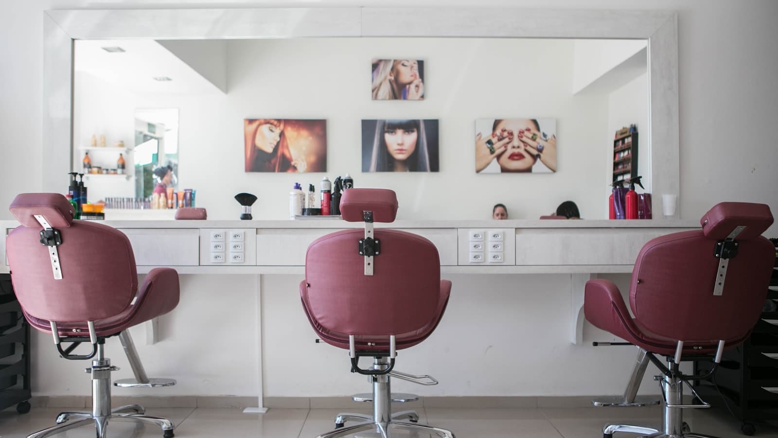 Stylist with a client in a modern hair salon